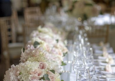 Top table wedding reception flowers